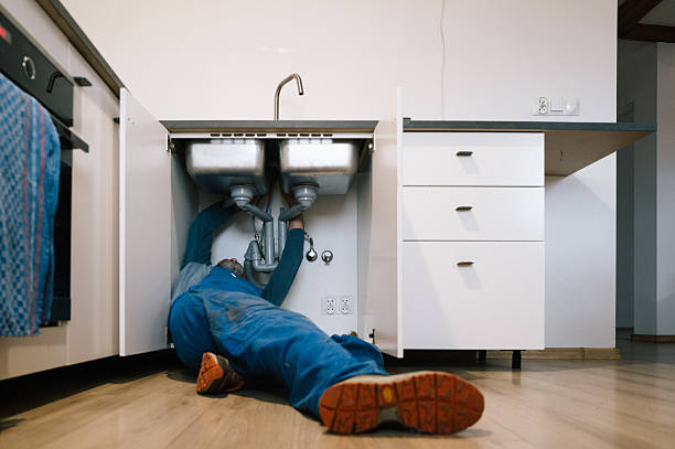 Professional Emergency Plumber technician working in Woodland Park, NE